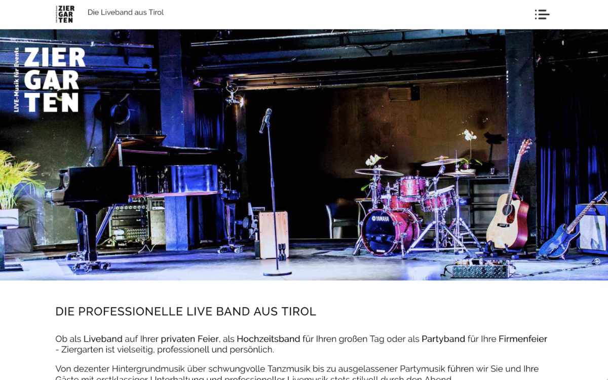 Laptop Bildschirm mit Bild von einer Musiker-Bühne mit Instrumenten